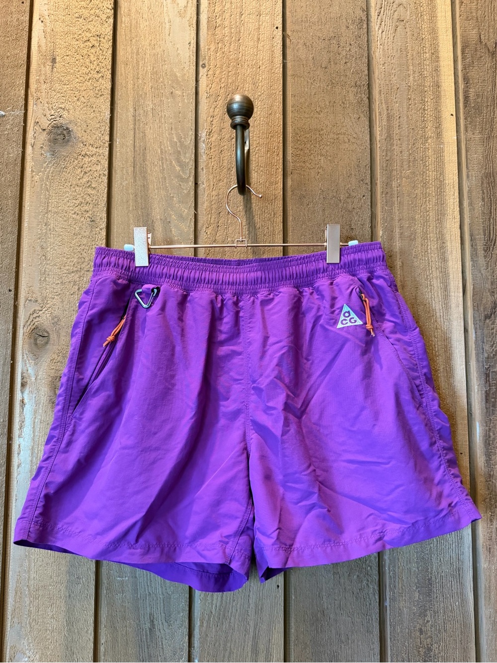 Nike ACG Purple Athletic Shorts with Orange Accents
